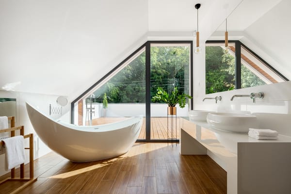 freestanding tub in an attic bathroom