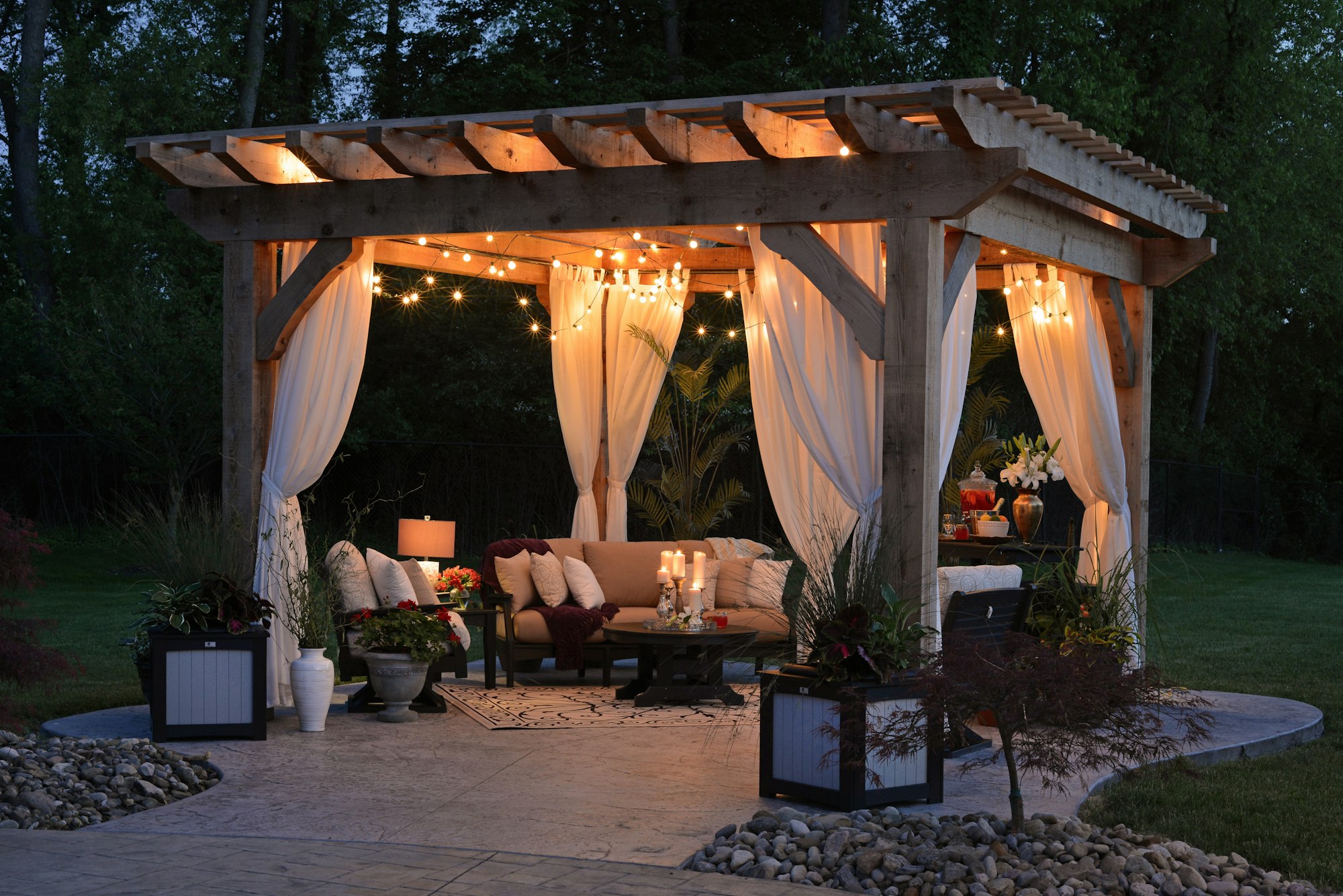 gazebo with lighting and curtains