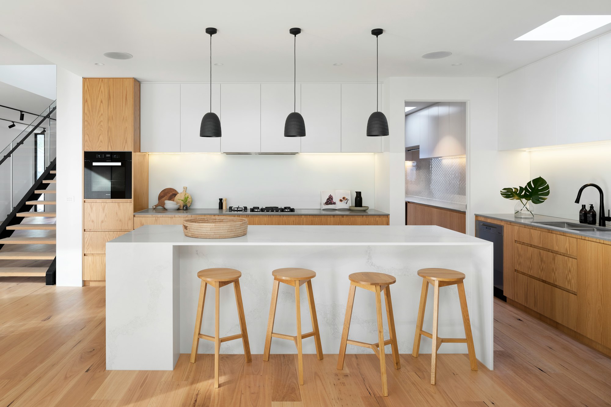 white kitchen with natural wood elements