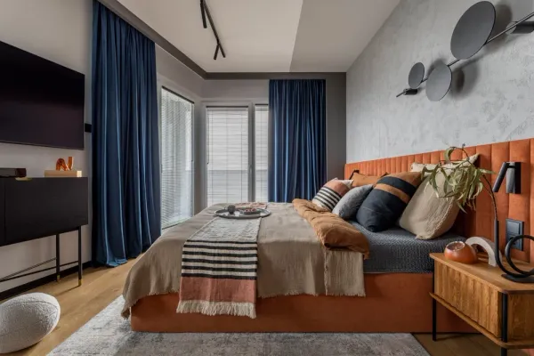 modern bedroom with a TV