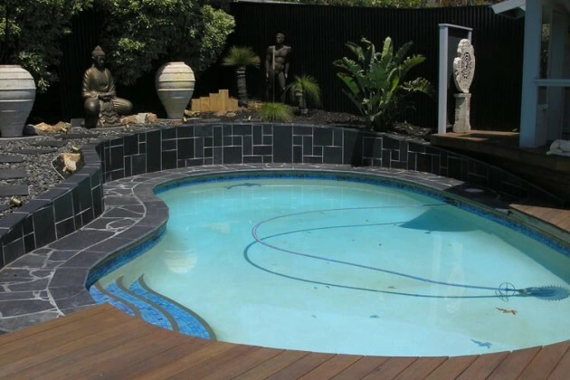 backyard with a pool designed with Planner 5D
