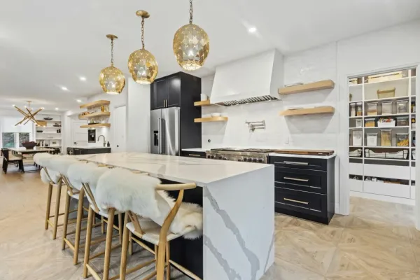 Modern high end kitchen with a waterfall island